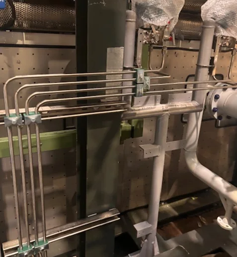 Small bore tubing supported and segregated from mechanical services